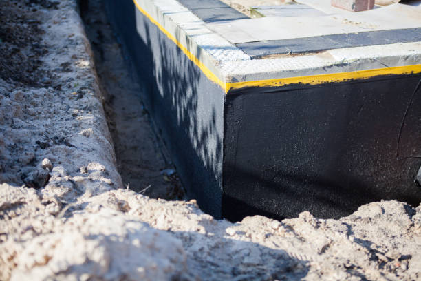 Professional Waterproofing technician working in Coalton, OH